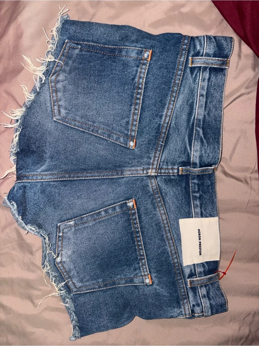 Heron Preston Blue Distressed Denim Shorts with White Graphic and Orange Patch
